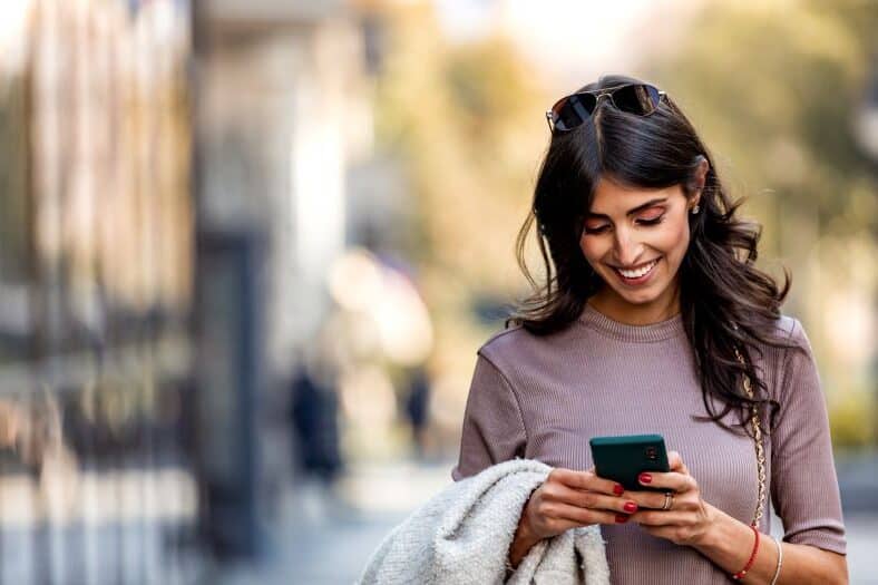 woman reading a personalized email